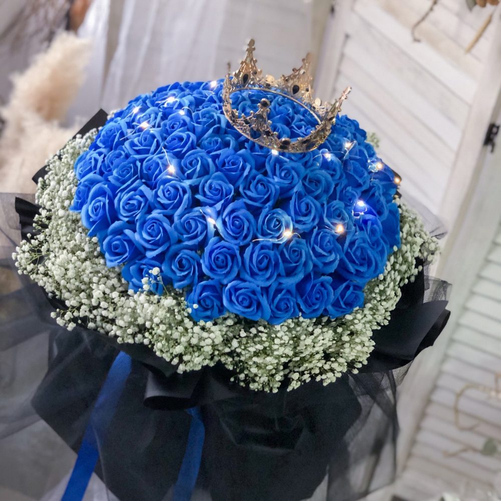 99 blue soap roses + Fairy light Bouquet