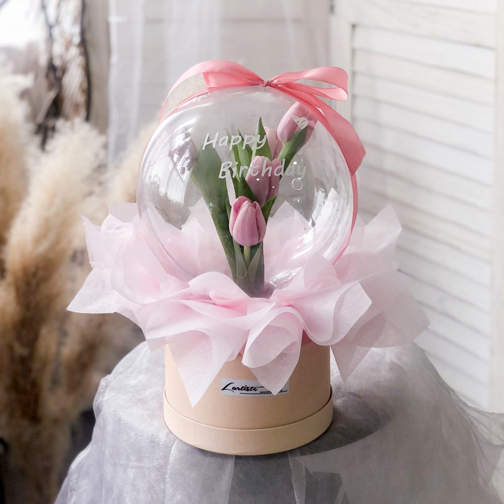 tulips in acrylic ball